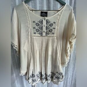 Ivory flutter sleeve embroidered top